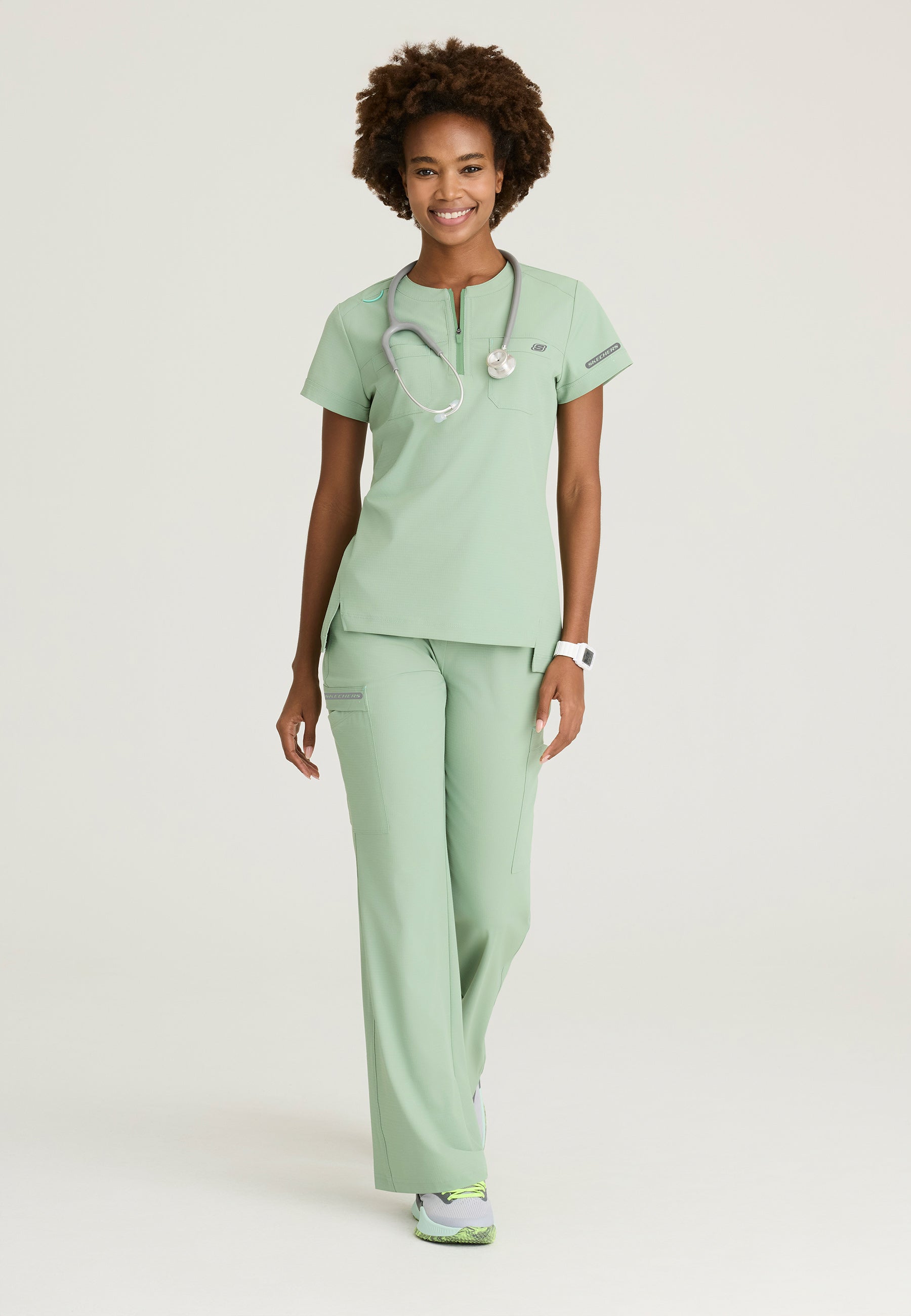 Skechers™ by Barco Ripstop Women's 2 Pocket Rounded Neck Tuck-In Top SKT284