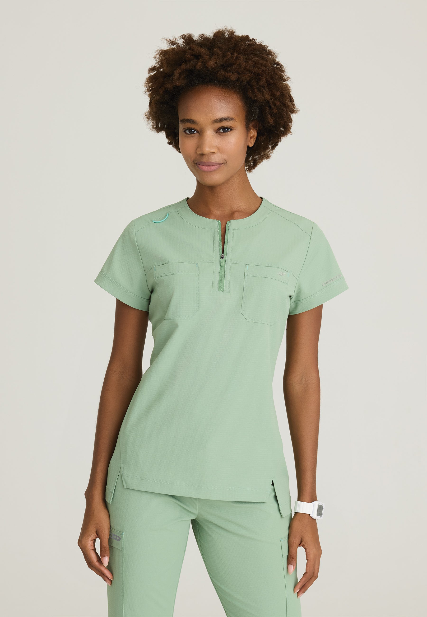 Skechers™ by Barco Ripstop Women's 2 Pocket Rounded Neck Tuck-In Top SKT284